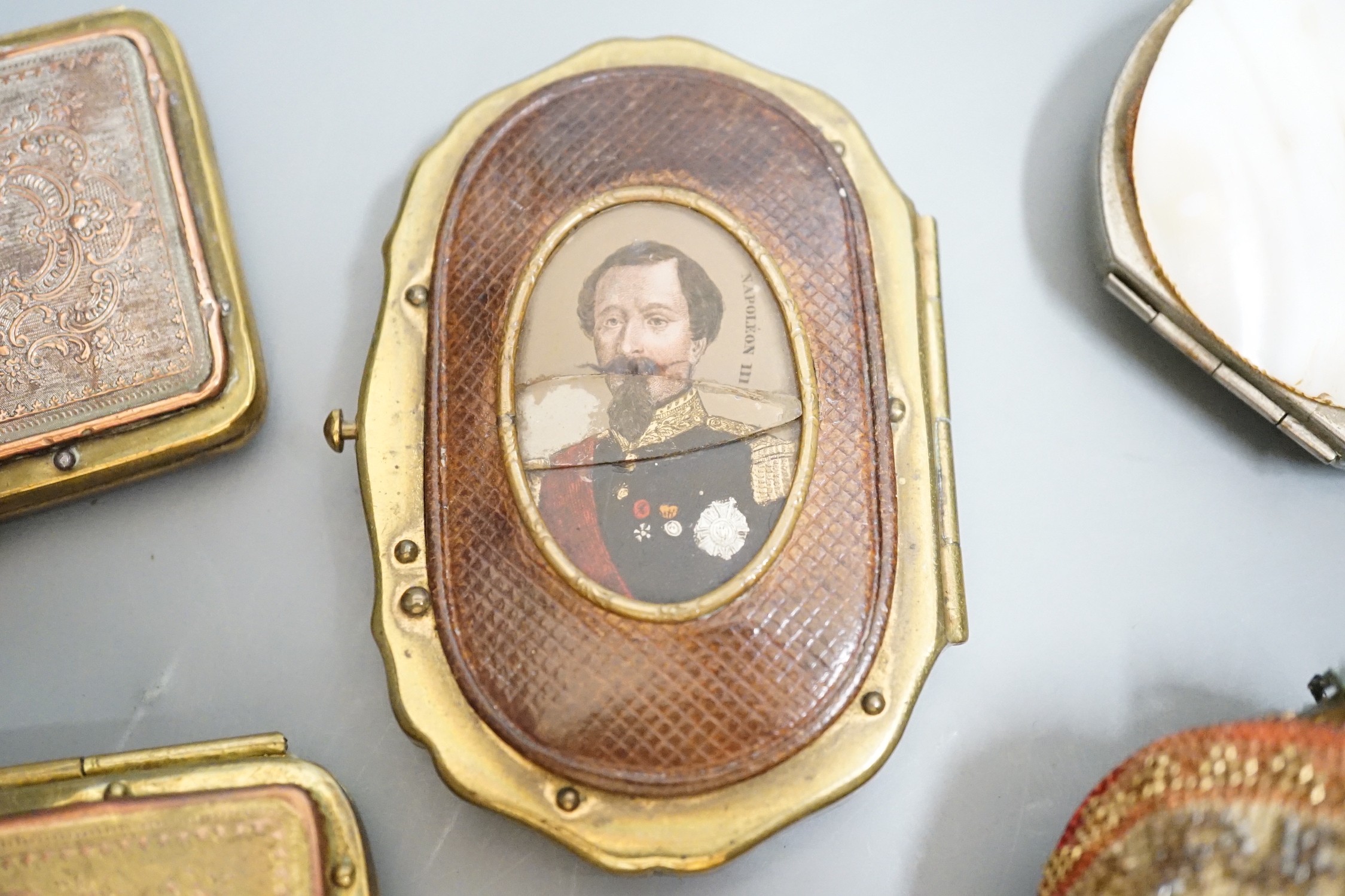 A 19th century Continental Royal commemorative purse and four Grand Tour souvenir purses